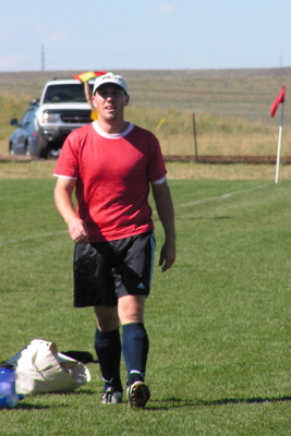 bill_walks_off_field_hat.JPG