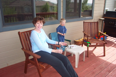 mom_max_new_chairs_deck.JPG